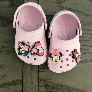 Baby crocs , lightly used. Charms included